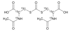 Бис(N-ацетил-DL-цистеинил-2,3-¹³C₂,¹⁵N)карбонил