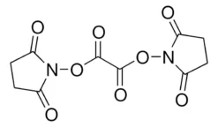 Оксалат бис(N-сукцинимидила)