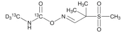 Сульфон альдикарба-(N-метил-¹³C,d₃, карбамоил-¹³C)